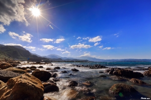 北海岸太陽芒.藍天白雲.娟絲海浪一張流